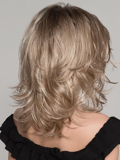 This no-fuss style is ready to wear right out of the box. Ocean has a hand tied mono part. Velvet lined ear tabs with adjustable straps at the nape for a personalized look *STYLED IMAGE: Tousled hair finished with BeautiMark Stay & Hold Hairspray*