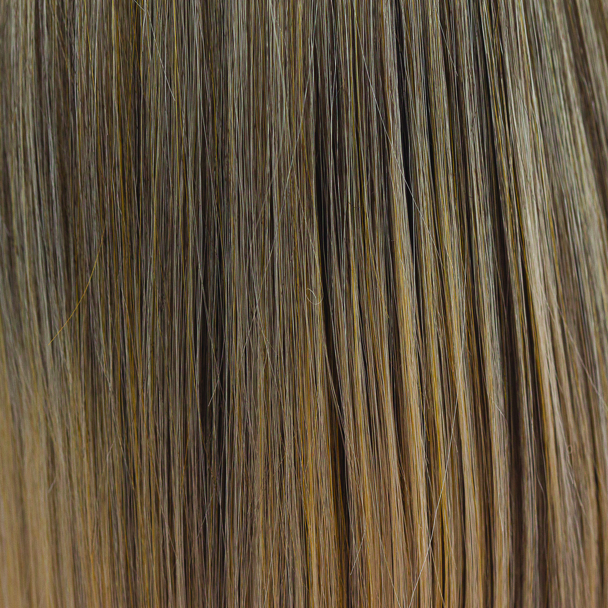 Buttered Toast  -  A medium blond smoky infusion of colors! Buttered Toast has a graduated blend of sandstone blonds and soft truffle weaves, with dark beige blond slices and buttery blended undertones.