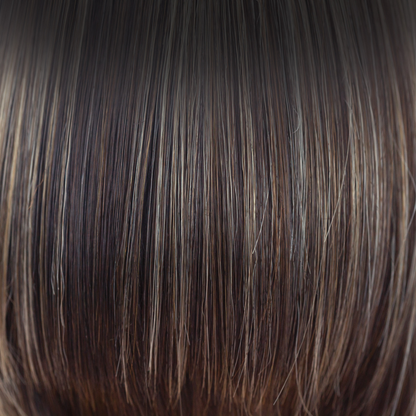 Chocolate Frost-R  -  The rooted version of Chocolate Frost-R brings soft warm medium brown base tones, splashed with a blend of cool light blond and dark warm blond highlights. The addition of neutral dark brown roots creates a modern yet realistic appearance.