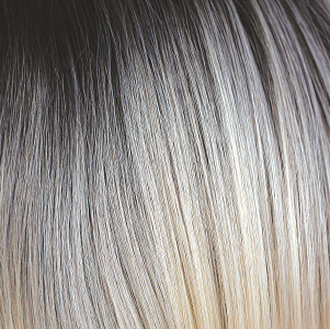 Creme de Coco  -  Pale cream and dark coco in contrast with one another, a fantastically dark root which then transverses into the cream coconut and whitey blond ash tones. Creme de Coco is an uber, cool color which maximizes fashion flair. It is one of our high heat colors.
