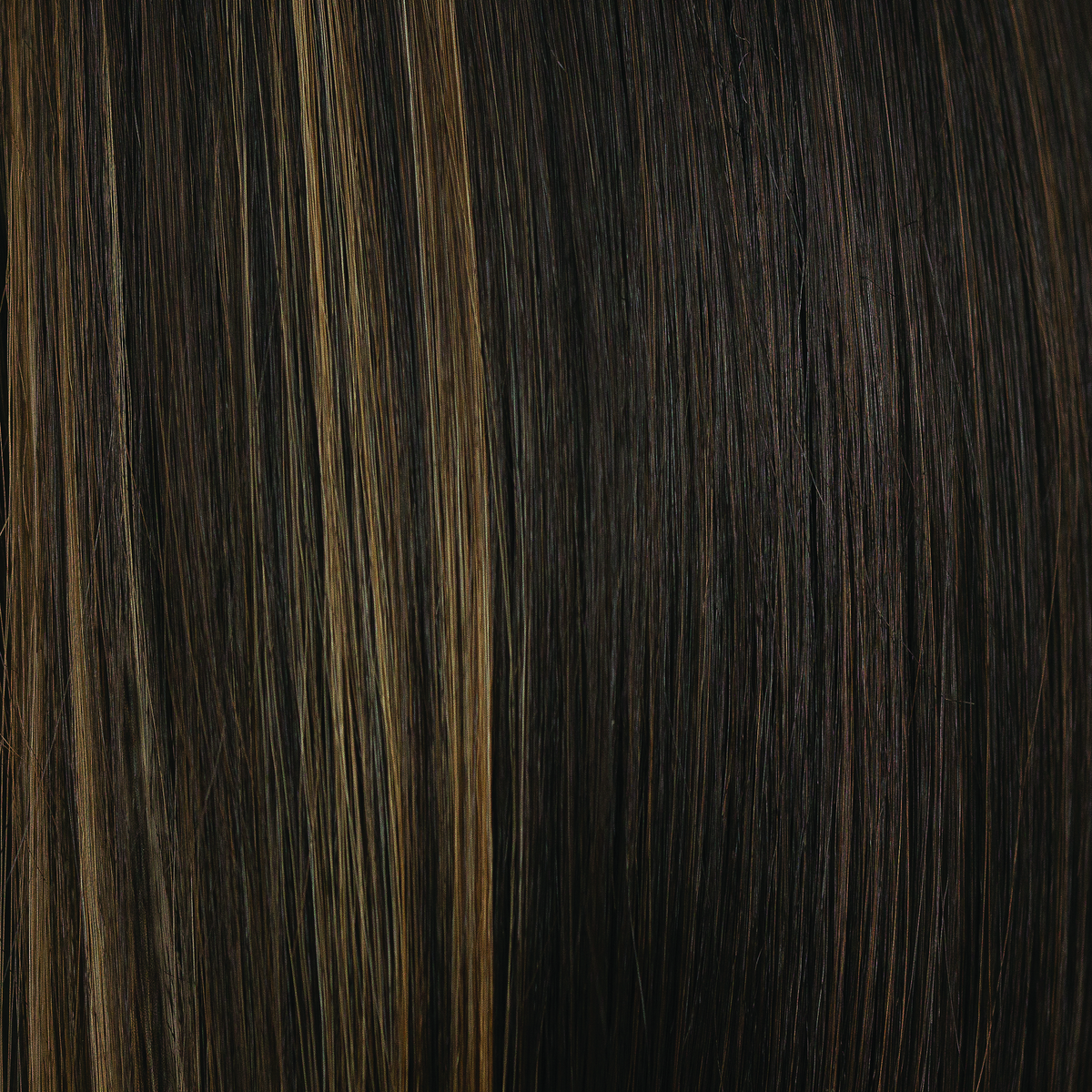 Fudge Ripple  -  Cool, dark brown based with ashy medium blond highlights. Fudge Ripple features carefully placed highlights frame a very lavish look.