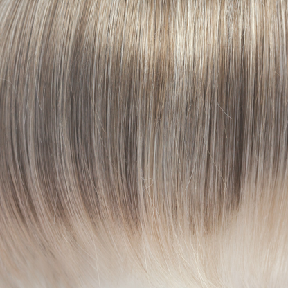 Ice Blond  -  This captivating clever color has a blend of beautiful ash blond highlights and velvet blonds. Towards the ends of the hair you are hit with blocks of ice blonde tips. This Ice Blond color combination is great in any style. It is crisp and cool… we love it!