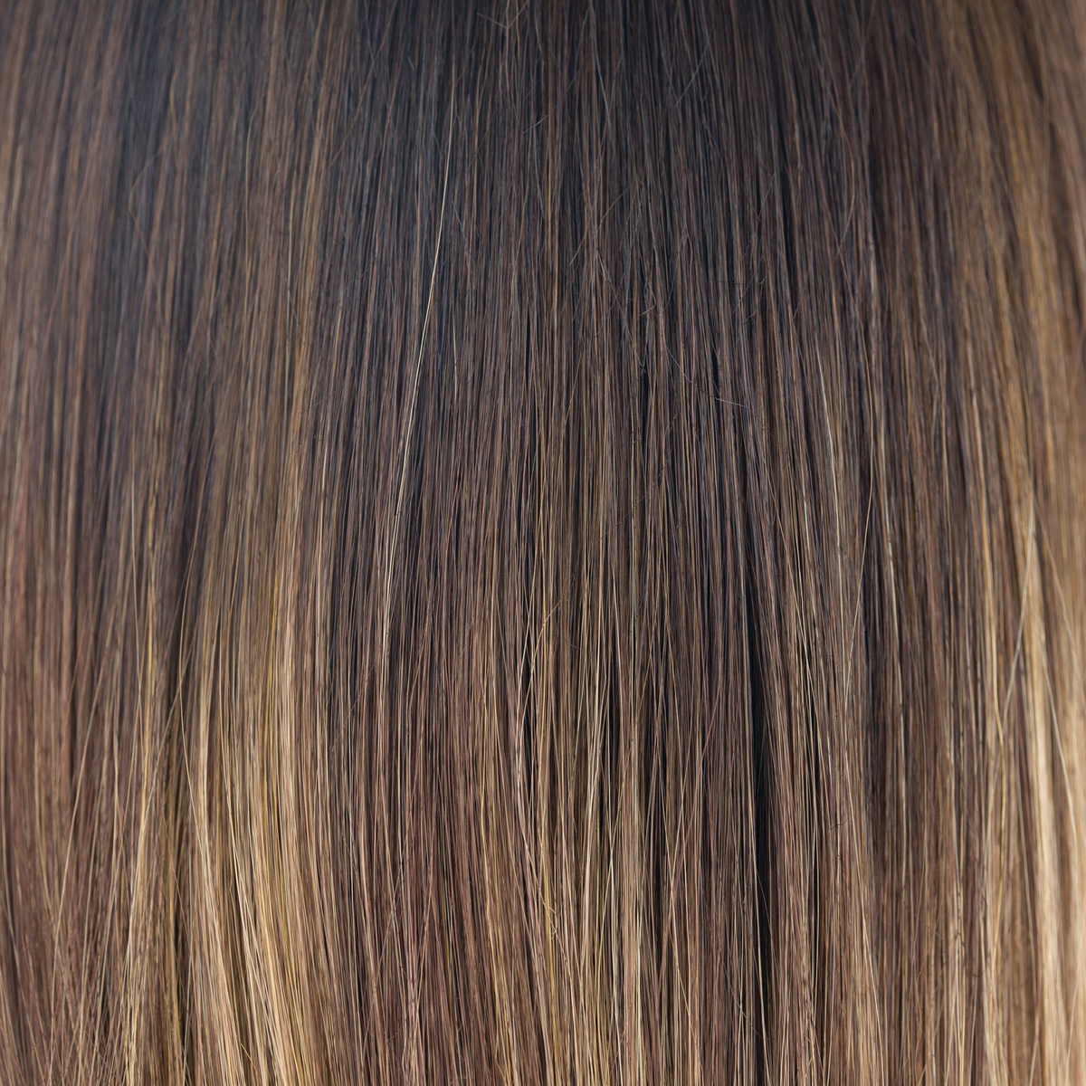 Marble Brown-LR  -  A long rooted beauty that combines the perfect mixture of warm dark brown and medium golden blond. Long, warm dark brown roots add a sophisticated finish.