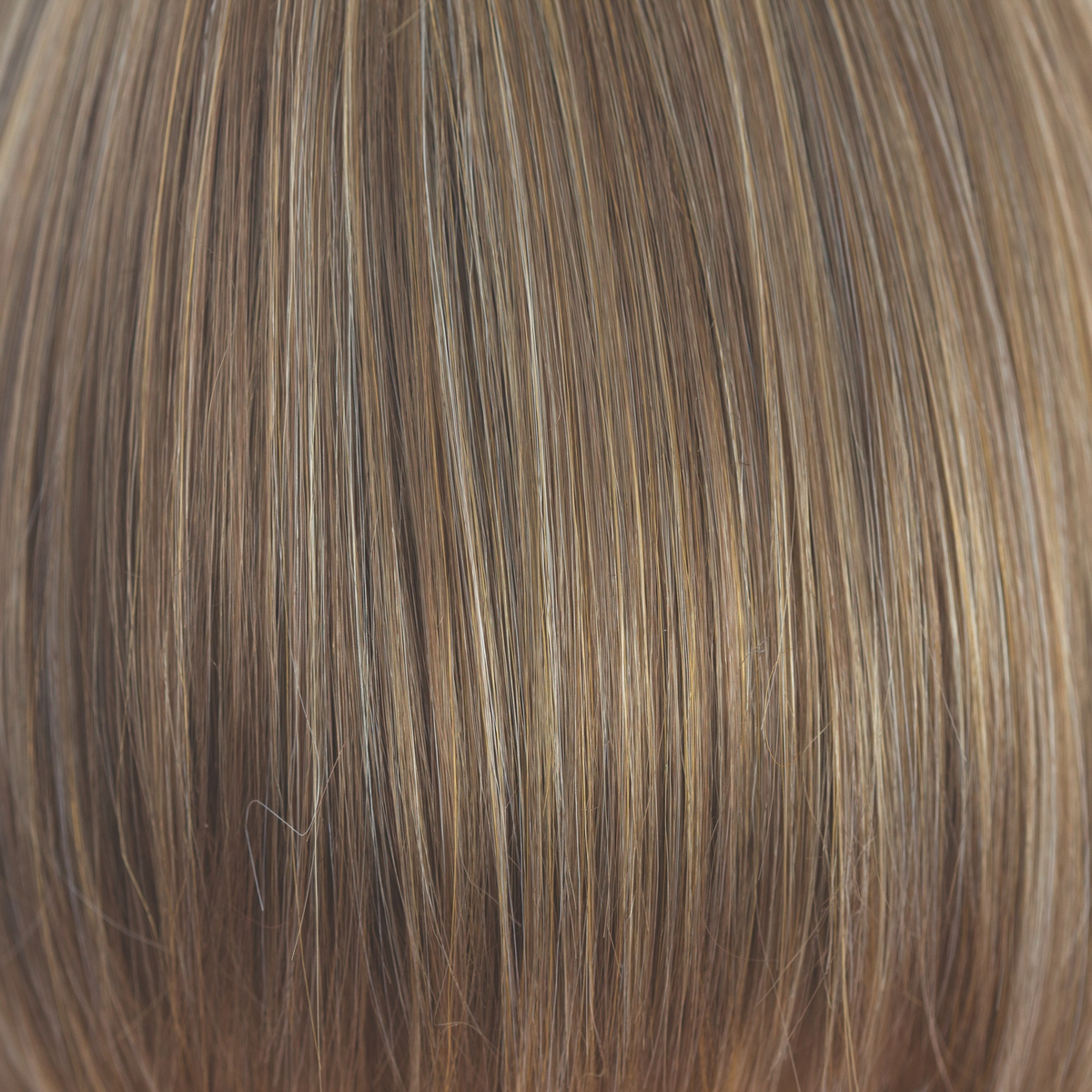 Mochaccino  -  A rich medium warm blond. The color has highlights of cream and icy coconut with a slight undertone of chocolate. This color is natural looking with an intelligently, placed, blended regrowth making this color so irresistible!