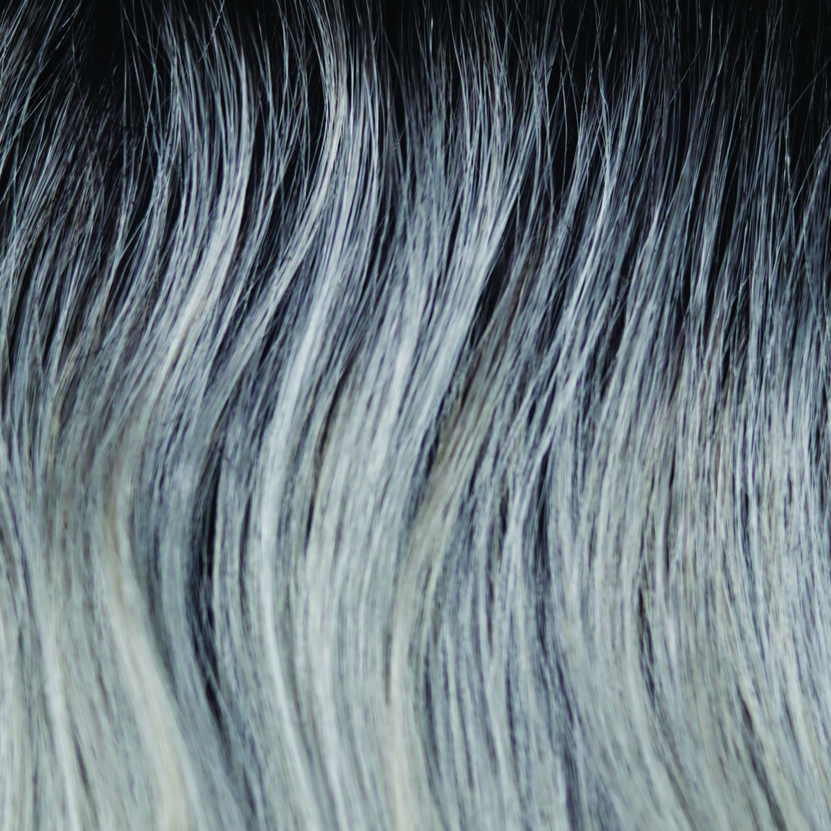 Moonstone  -  This blend of cool white silver gray and creamy white gray tones is our Moonstone color. The subtle, refined beauty of this color palette is completed with the addition of natural dark brown roots. An excellent choice for those that want a fashion-forward, dreamy look!
